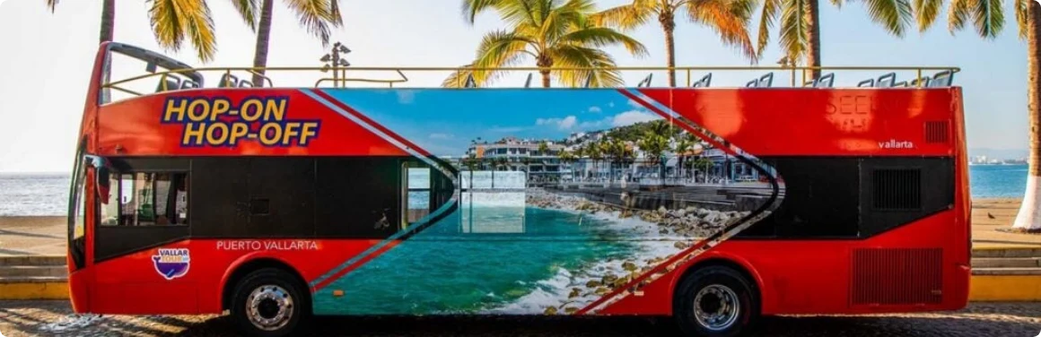 Tourist bus arriving to Puerto Vallarta, highlighting the transportation options to reach the destination.