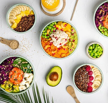 Smiling person giving a thumbs-up, feeling confident with fresh breath.